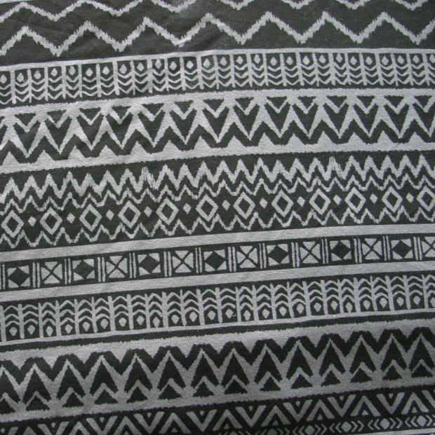 Black Tribal Print on Dark Grey Cotton Lycra Knit Fabric