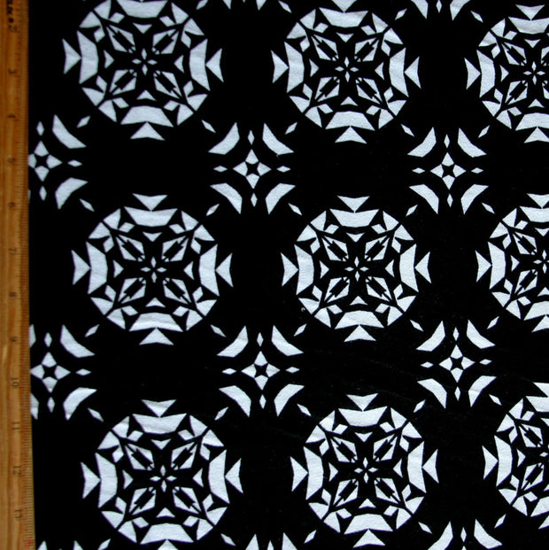 Paper Snowflakes on Black Cotton Lycra Knit Fabric