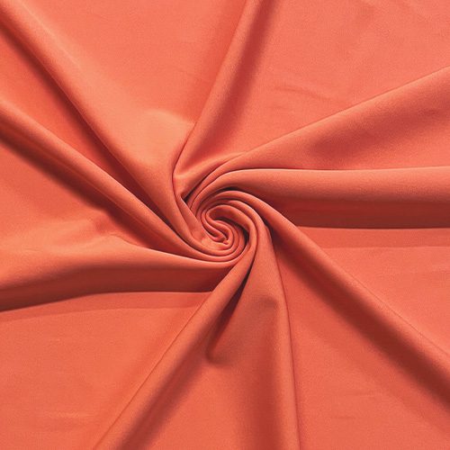 Endurance Persimmon Repreve Recycled Polyester Spandex Knit Fabric