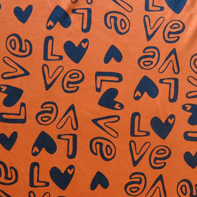 Love on Orange Cotton Spandex Jersey Knit Fabric
