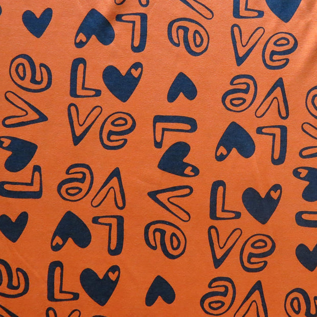 Love on Orange Cotton Spandex Jersey Knit Fabric