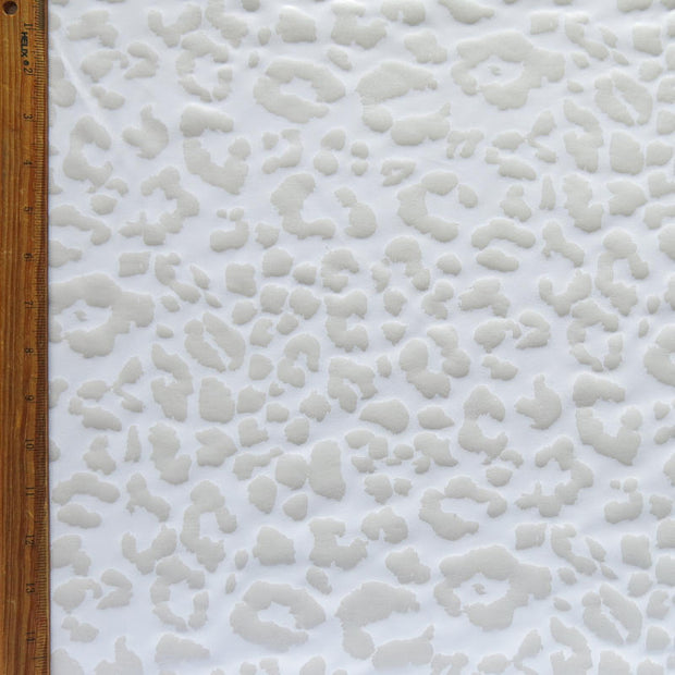 Olympus White Leopard Foil Poly Spandex Athletic Jersey Knit Fabric