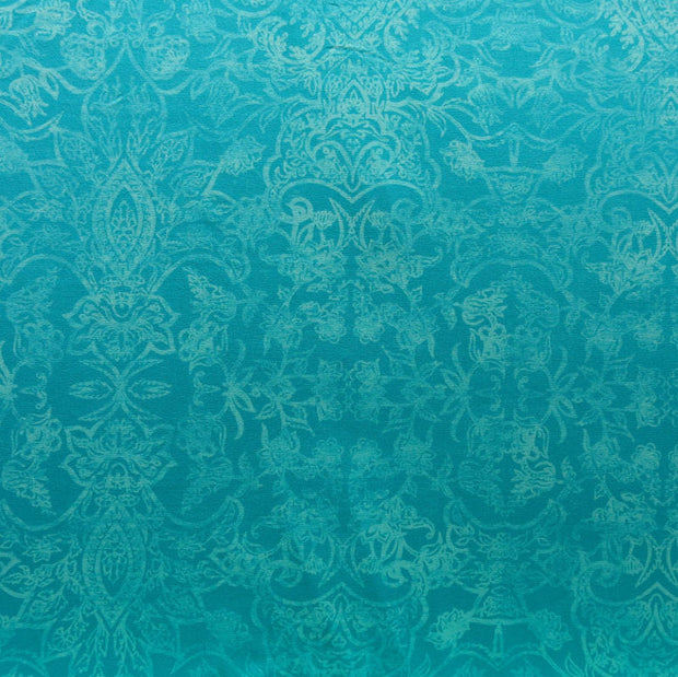 Antiqued Paisley on Mint Poly Spandex Knit Fabric