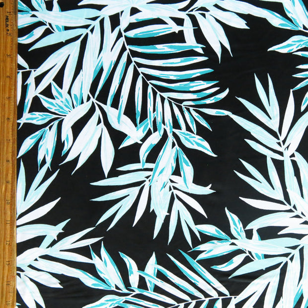 Green and White Foliage on Black Nylon Spandex Swimsuit Fabric