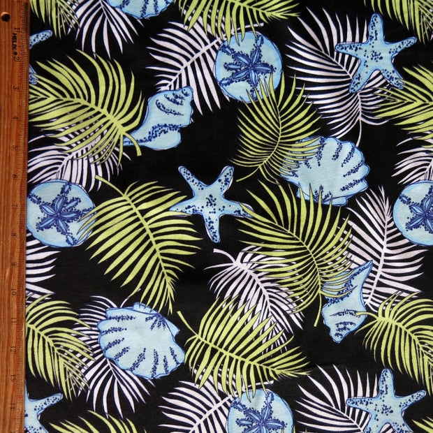Shells and Palm Fronds on Black Cotton Knit Fabric