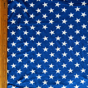White Patriotic Stars on Royal Cotton Knit Fabric