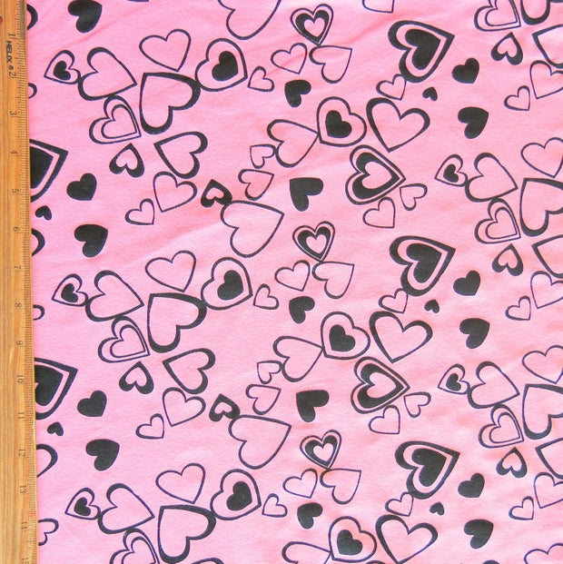 Black Hearts on Pink Cotton Spandex Knit Fabric