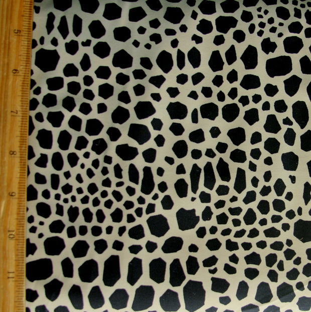 Black Spots on Taupe Nylon Lycra Swimsuit Fabric