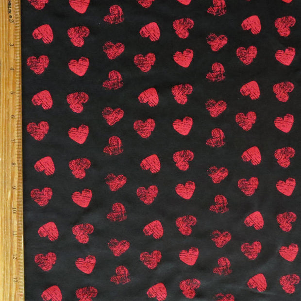 Red Distressed Hearts on Black Cotton Spandex Knit Fabric