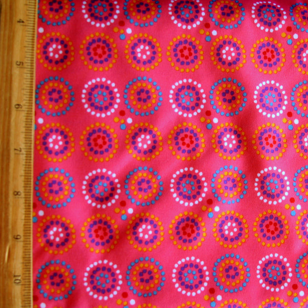 Dotty Circles PUL Knit Fabric, Pink Colorway