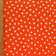 White Dotty Dots on Brilliant Orange Cotton Lycra Knit Fabric