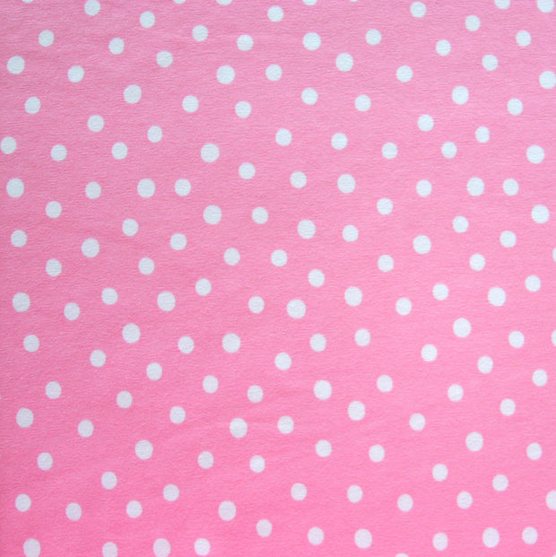 White Dotty Dots on Light Pink Cotton Lycra Knit Fabric