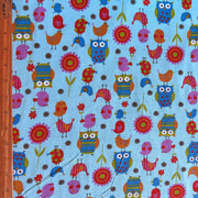 Friendly Flappers on Aqua Cotton Knit Fabric