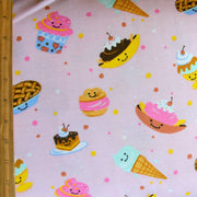 Happy Treats on Pink Cotton Knit Fabric