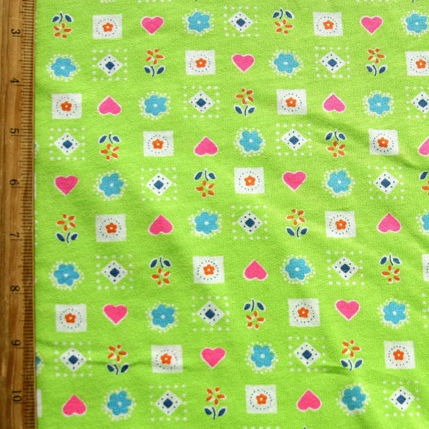 Hearts and Flowers on Lime Cotton Knit Fabric