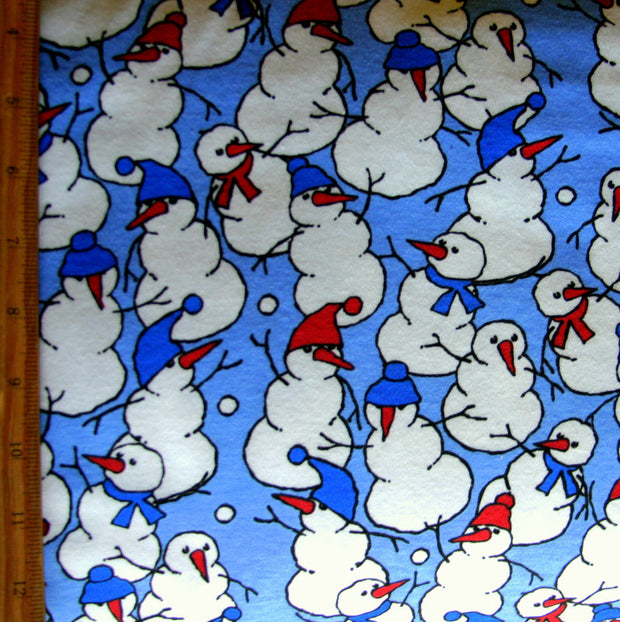 Holiday Snowmen on Blue Cotton Interlock Fabric