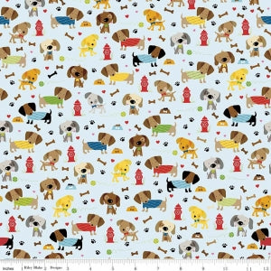 Rover Dog Park Blue Cotton Lycra Knit Fabric by Riley Blake