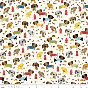 Rover Dog Park Cream Cotton Lycra Knit Fabric by Riley Blake