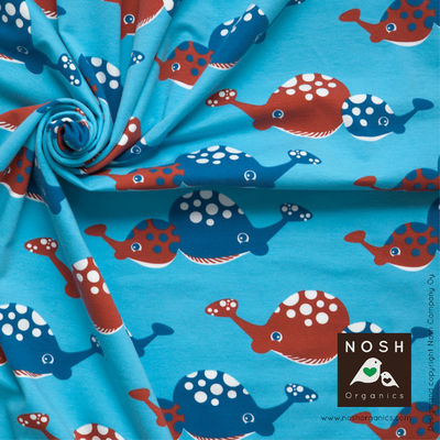 Happy Whale Organic Cotton Lycra Knit Fabric by Nosh Organics, Ketchup Colorway