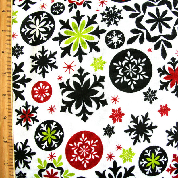 Mod Snowflakes on White Cotton Knit Fabric