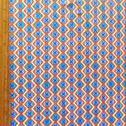 Orange and Royal Fleur de Lis Nylon Spandex Swimsuit Fabric
