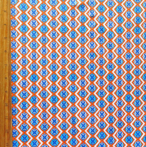 Orange and Royal Fleur de Lis Nylon Spandex Swimsuit Fabric