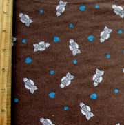 Cream Owls and Turquoise Hearts on Brown Cotton Knit Fabric