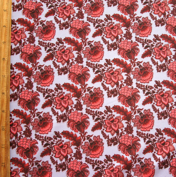 Peach, Salmon, and Burgundy Paisley on Very Light Purple Nylon Spandex Swimsuit Fabric