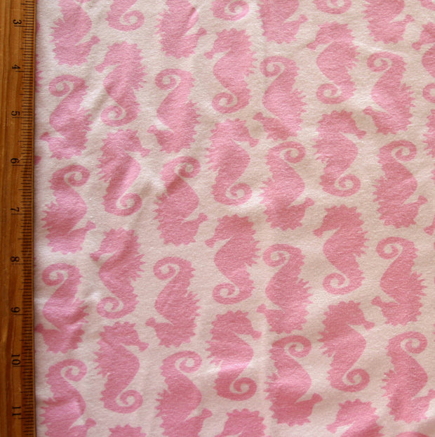 Seahorses on Pink Cotton Lycra Knit Fabric by Flaphappy
