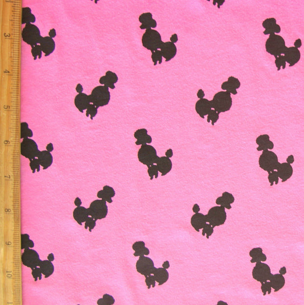 Black Poodles on Pink Cotton Knit Fabric