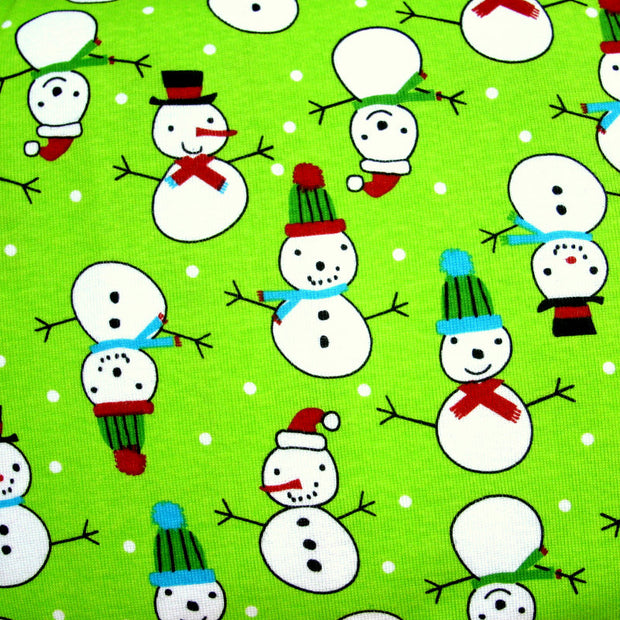 Snowmen and Polka Dots on Lime Cotton Knit Fabric