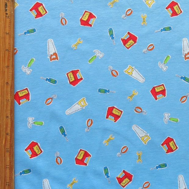 Tools on Blue Cotton Knit Fabric