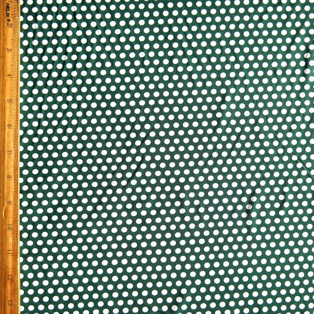 White Aspirin Polka Dots on Hunter Green Nylon Spandex Swimsuit Fabric