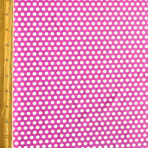 White Aspirin Polka Dots on Jazzberry Pink Nylon Spandex Swimsuit Fabric
