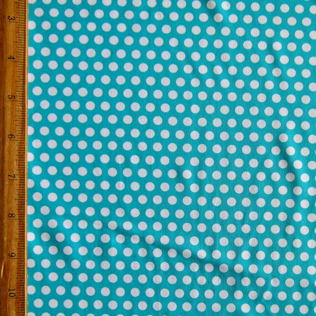 White Aspirin Polka Dots on Laribe Nylon Spandex Swimsuit Fabric