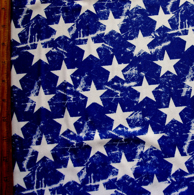 White Distressed Stars on Royal Nylon Lycra Swimsuit Fabric - 14" Remnant