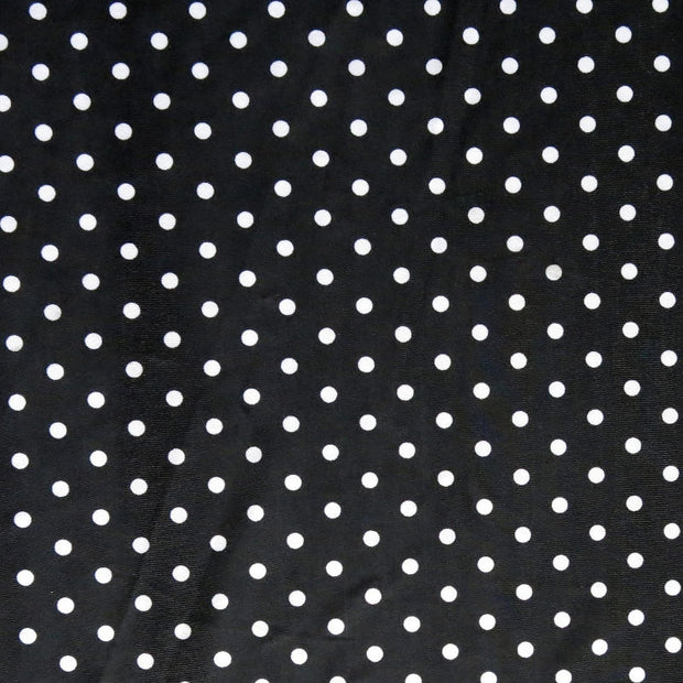 White Eraser Polka Dots on Black Nylon Spandex Swimsuit Fabric