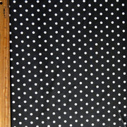 White Eraser Polka Dots on Black Nylon Spandex Swimsuit Fabric