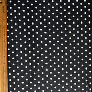 White Eraser Polka Dots on Black Nylon Spandex Swimsuit Fabric