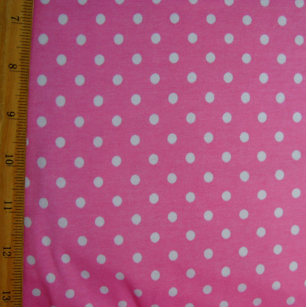 White Eraser Polka Dots on Pink Cotton Lycra Knit Fabric