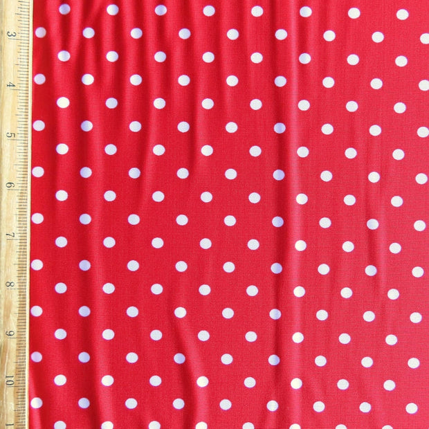 Pink Eraser Polka Dots on Red Nylon Spandex Swimsuit Fabric
