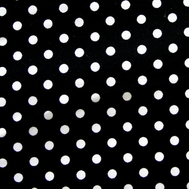 White Eraser Polka Dots on Black Cotton Lycra Knit Fabric