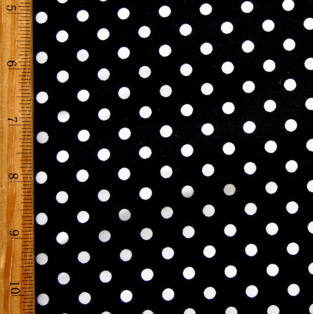 White Eraser Polka Dots on Black Nylon Lycra Swimsuit Fabric