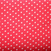 White Eraser Polka Dots on Coral Pink Cotton Knit Fabric
