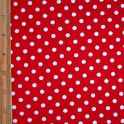 White Eraser Polka Dots on Red Nylon Lycra Swimsuit Fabric