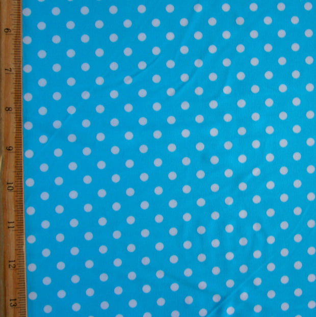 White Eraser Polka Dots on Turquoise Blue Nylon Lycra Swimsuit Fabric