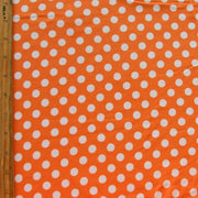 White Polka Dots on Pumpkin Orange Cotton Lycra Knit Fabric