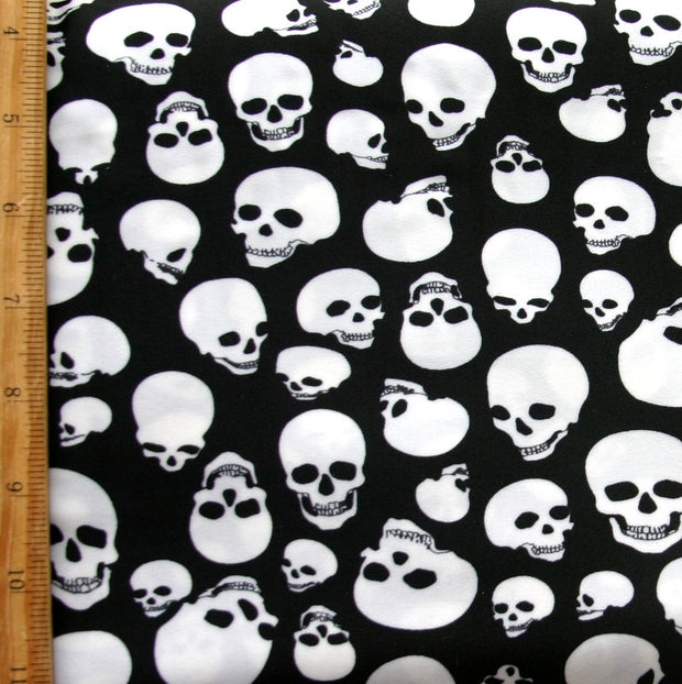 White Skulls on Black Nylon Lycra Swimsuit Fabric