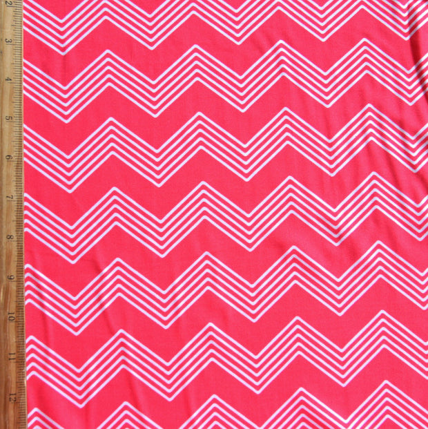 White Zig Zags on Fluorescent Orange Nylon Lycra Swimsuit Fabric