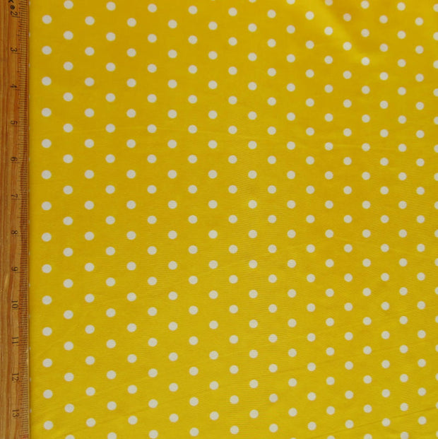 White Eraser Polka Dots on Goldenrod Nylon Spandex Swimsuit Fabric
